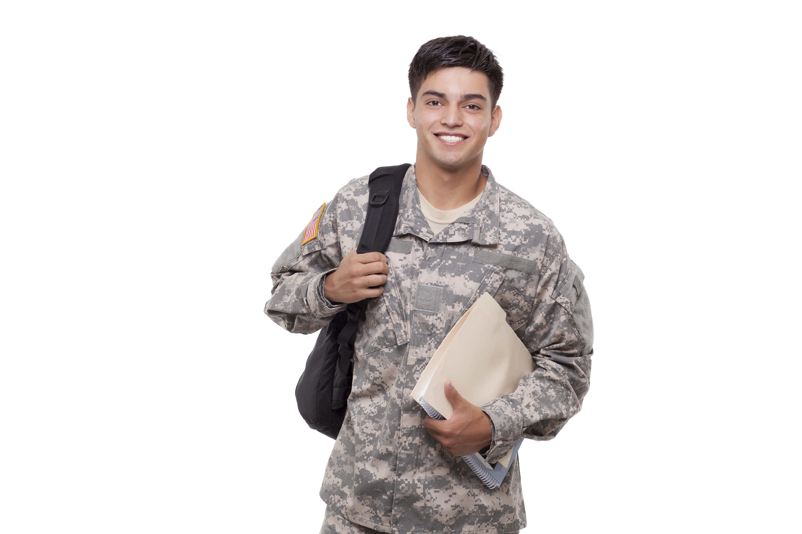 A soldier in uniform carrying college books and paperwork.