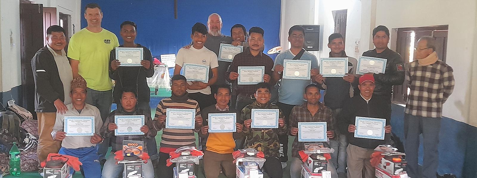 Welding class graduates in Nepal display their certificates. (Photo: Micah Cornerstone Ministries)
