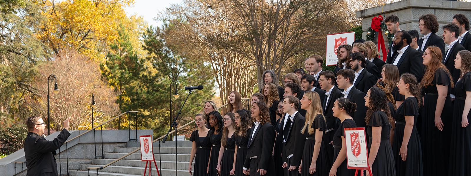 The CIU Ambassador Choir on the steps of the South Carolina Statehouse directed by Bryce Thompson. (Photo by Noah Allard) 
