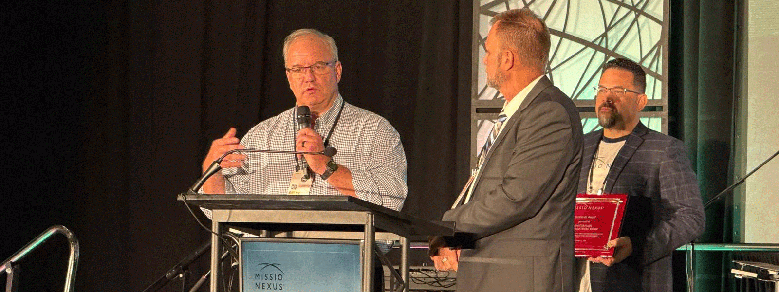 Brent McHugh accepts the eXcelerate Award from Missio Nexus. (Photo provided) 