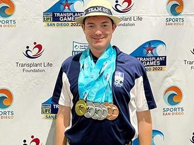 Taylor Novinger with his Transplant Games medals in San Diego last summer. (Photo provided) 