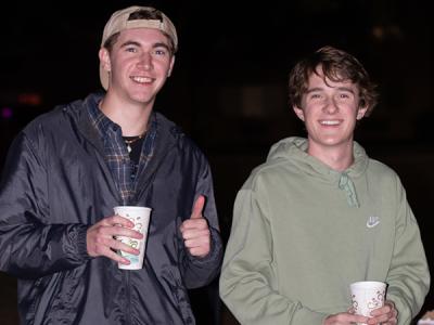 It's "thumbs up" on the hot drinks at Christmas on the Quad. (Photo by Macey Drye, CIU student photographer)