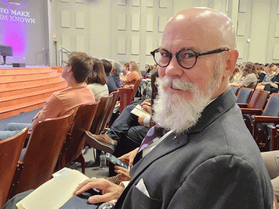 Dr. Tom Mullkin prepares to speak to CIU students. (Photo courtesy of W. Thomas Smith Jr.)