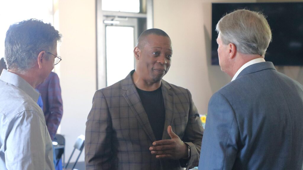 Anthony Bryant of Grimaud Enterprises chats with fellow business leaders