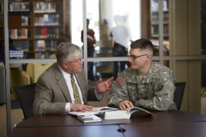 Dr. Langston meets with a CIU military student, reflecting mentorship and preparation for military chaplaincy.