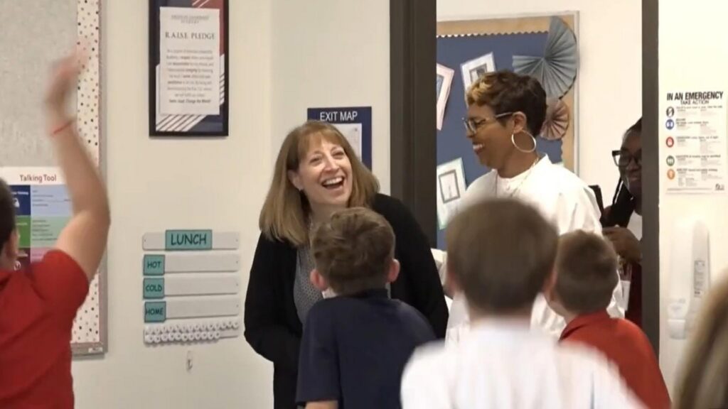 Sharon Hanna is surprised by her third-grade class at American Leadership Academy