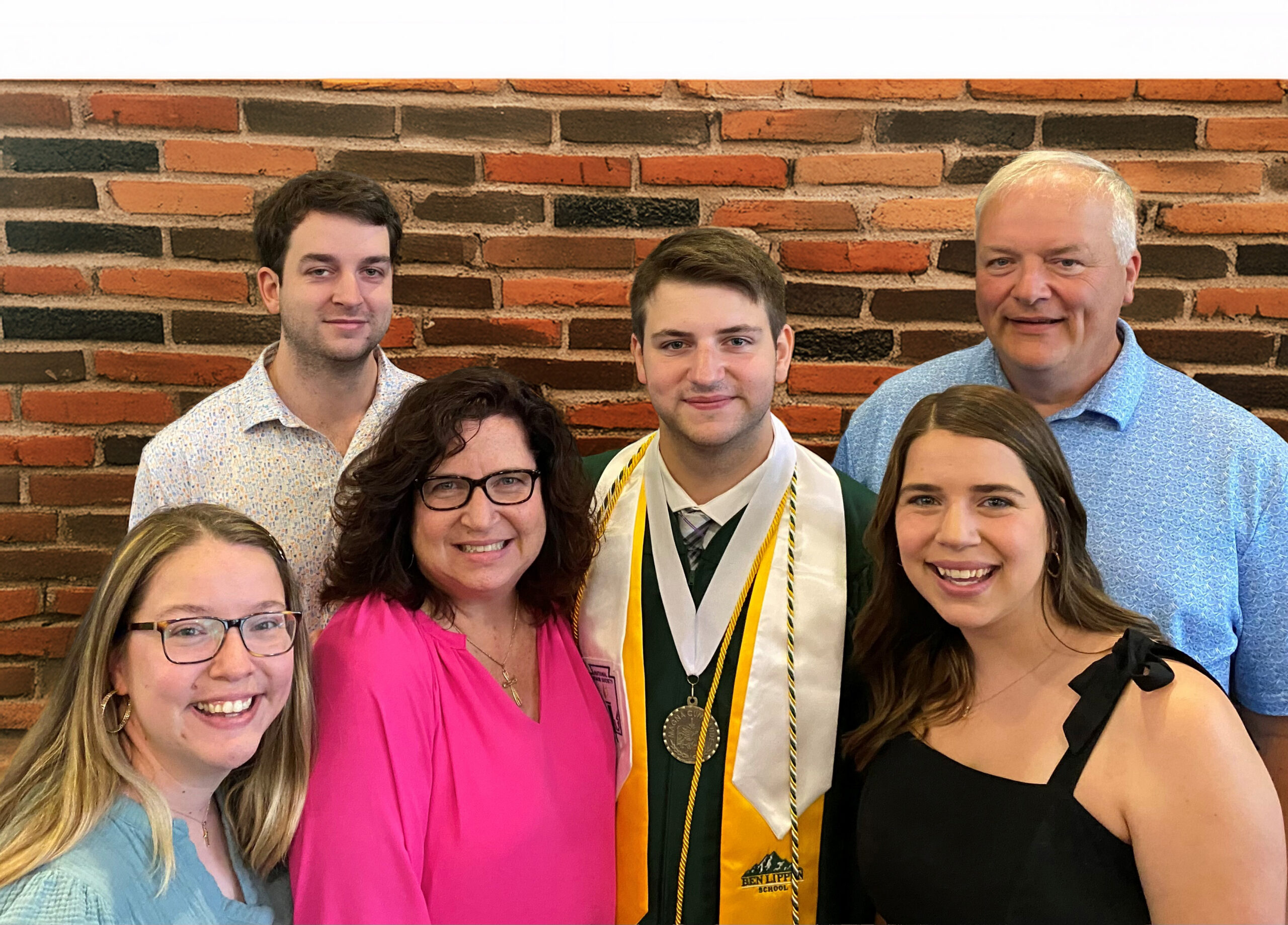 The Wegren family poses together at their son’s high school graduation, celebrating his completion of high school after participating in CIU’s dual enrollment program.